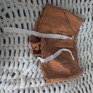 Wilfred tan knit top with white label